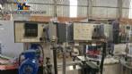 Automatic double head labeling machine for flat bottles Bauch Campos