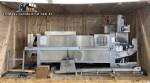 Tetra Pak A3 aseptic filling machine with cardboard packer 70 and tray shrink 51.