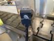 Automatic self-adhesive labeling machine for cylindrical bottles