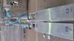 Semi-automatic pneumatic liquid filling machine with two nozzles
