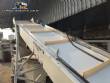 Inclined conveyor belt with talisca