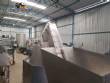 Complete filling line with Tecman Nelpas Tecnoenvase Tudela bottle filling, labeling, capping, and positioning machines for cosmetic liquids.