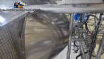 Stainless steel surge tank with agitator, 2000 liters.