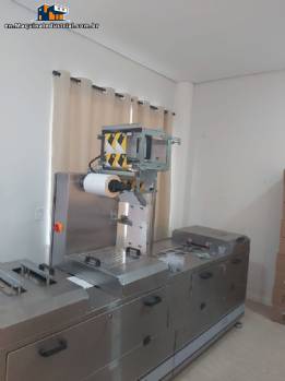Automatic thermoforming machine with two lanes