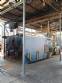 Wood-fired flame tube boiler for steam generation