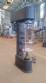 Filling machine with 2 nozzles for liquids and pilfer cap screwer