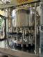 Packaging line with IMSB bung capper, Maqmundi labeler and accumulator table