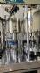 Packaging line with IMSB bung capper, Maqmundi labeler and accumulator table