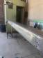 Gravimetric rotary filling machine in stainless steel with cabin