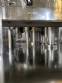 Gravimetric rotary filling machine in stainless steel with cabin