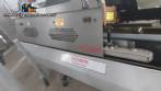 Fischbein PBC 6000 multi-layer paper bag sealer, closing and folding machine.