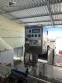 Automatic labeling machine for flat cylindrical bottles and jars Maqmundi