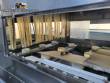 Filling line for 10 and 20 liter gallon jugs with filling machine and rinser/washer.