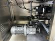Automatic volumetric dosing packaging machine for powder products.