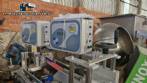 Automatic double-head labeling machine for cylindrical and flat bottles, Tudela, 3,000 labels per hour.