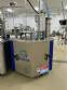 Rotary filling machine with Bramak aa jar capping sealer