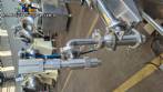 Semi-automatic stainless steel liquid filling machine with 1 nozzle.