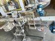Labeling machine for dropper bottles with double printhead transparent stainless steel label