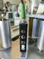 Labeling machine for dropper bottles with double printhead transparent stainless steel label