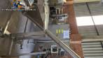 Inclined screw conveyor with stainless steel silo