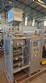 Filling machine for sachet with two dosers