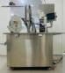 Capsule encapsulator, counter and polisher, capacity 22,000 capsules per hour.