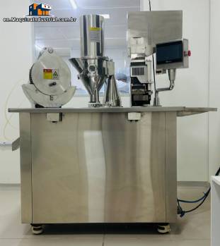 Capsule encapsulator, counter and polisher, capacity 22,000 capsules per hour.