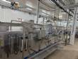 Horizontal stainless steel packaging machine for Profills stand-up pouch packaging.