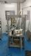 Rotmaq screw capping machine with cap positioning elevator