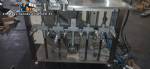 Linear filling machine with 6 pistons filling system