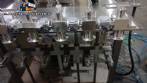 Linear filling machine with 6 pistons filling system
