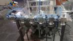 Linear filling machine with 6 pistons filling system