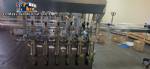 Linear filling machine with 6 pistons filling system