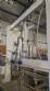 Labeling machine with steam sleeve tunnel and bottle baler