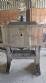 Labeling machine with steam sleeve tunnel and bottle baler