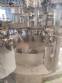 Zegla rotary filling machine with rinser and three-block capping system.
