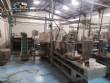 Automatic filling and sealing machine for gelatin cups, 12,000 units/hour.