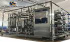 Membrane filtration system for whey permeate