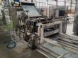 Continuous line laminator, cutter and folder for long dry pasta (tagliatelle).
