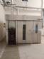 Indupan double trolley rotary oven with pellet heating.