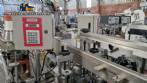 Prolabel double-head labeling machine for flat bottles